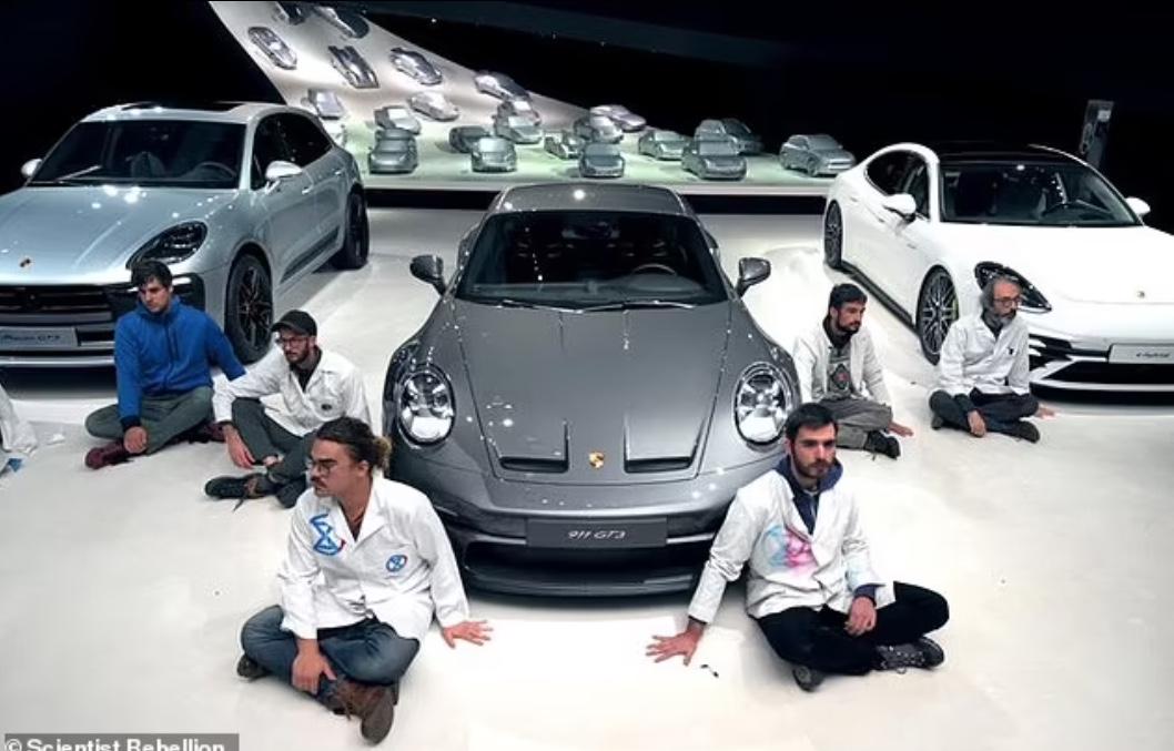 Climate protesters glue themselves to Porsche museum but needed to