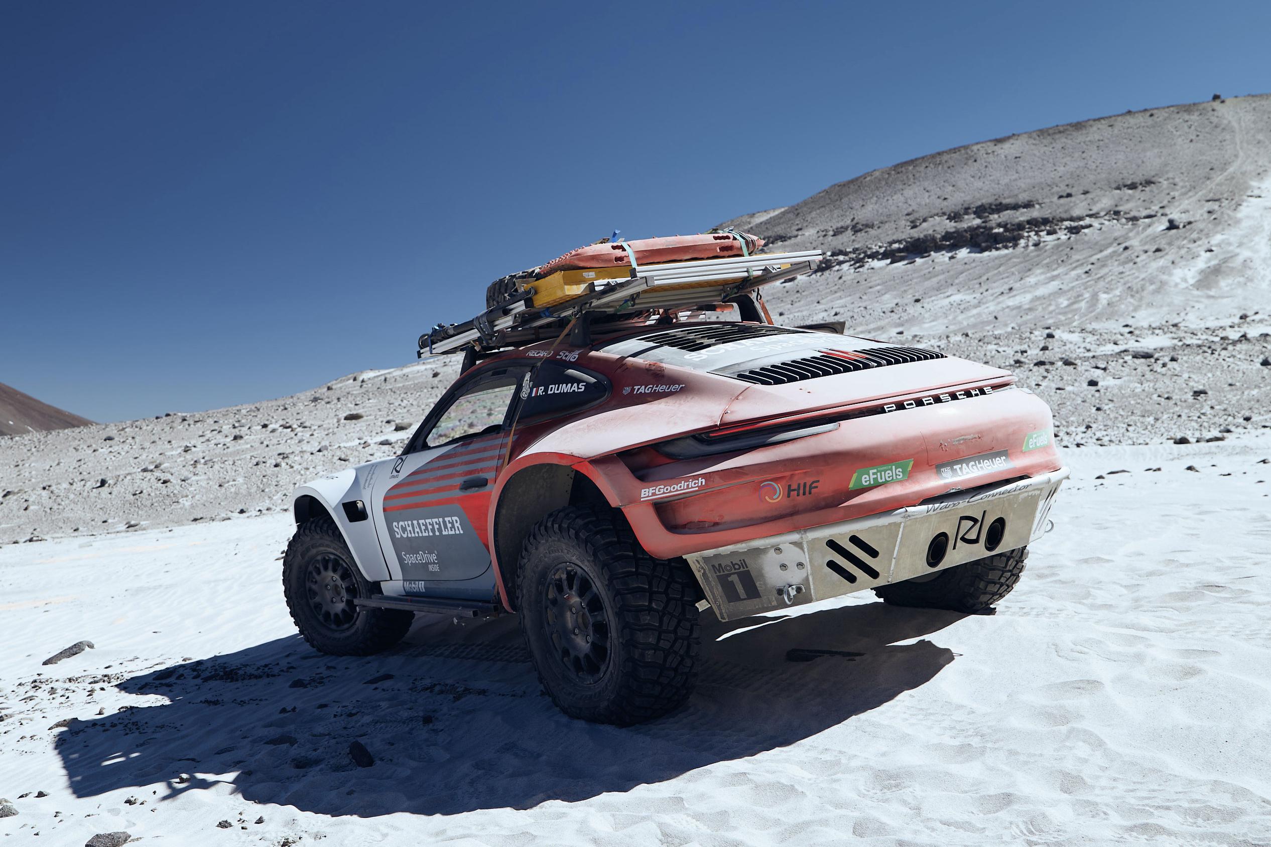 Rugged Porsche 911 topples Unimog with dizzying world record
