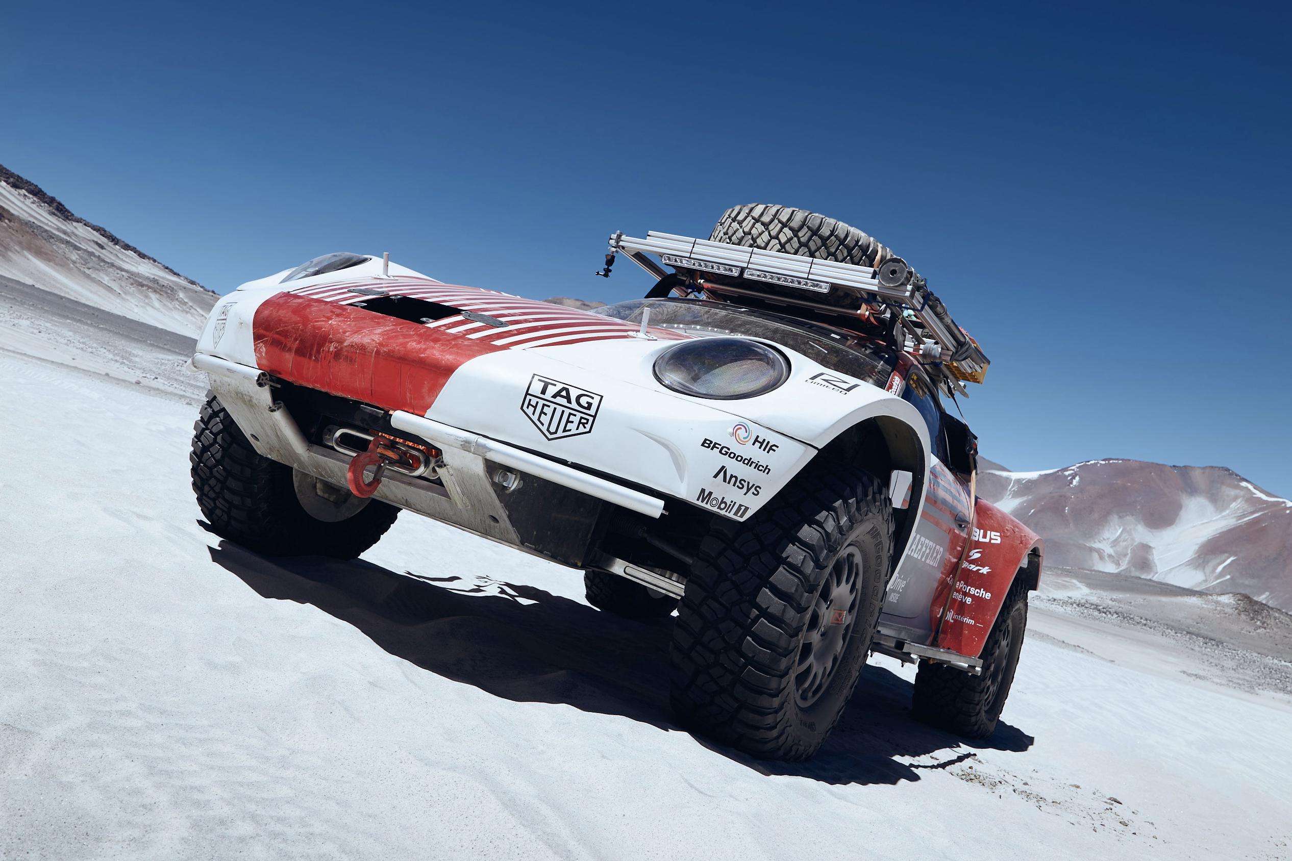 Rugged Porsche 911 topples Unimog with dizzying world record