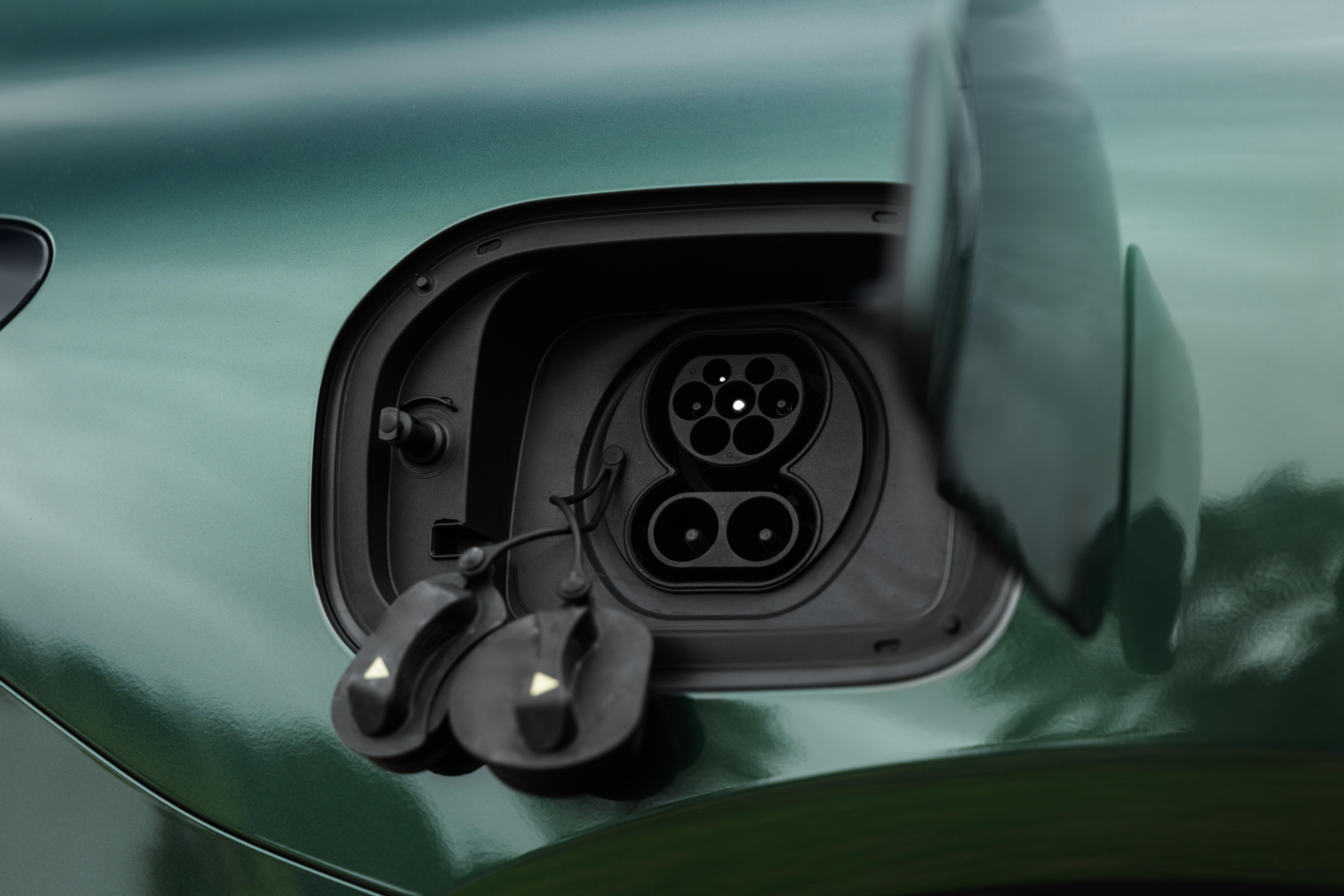 Charge port detail on a plug-in hybrid, key to the EREV hardware story.