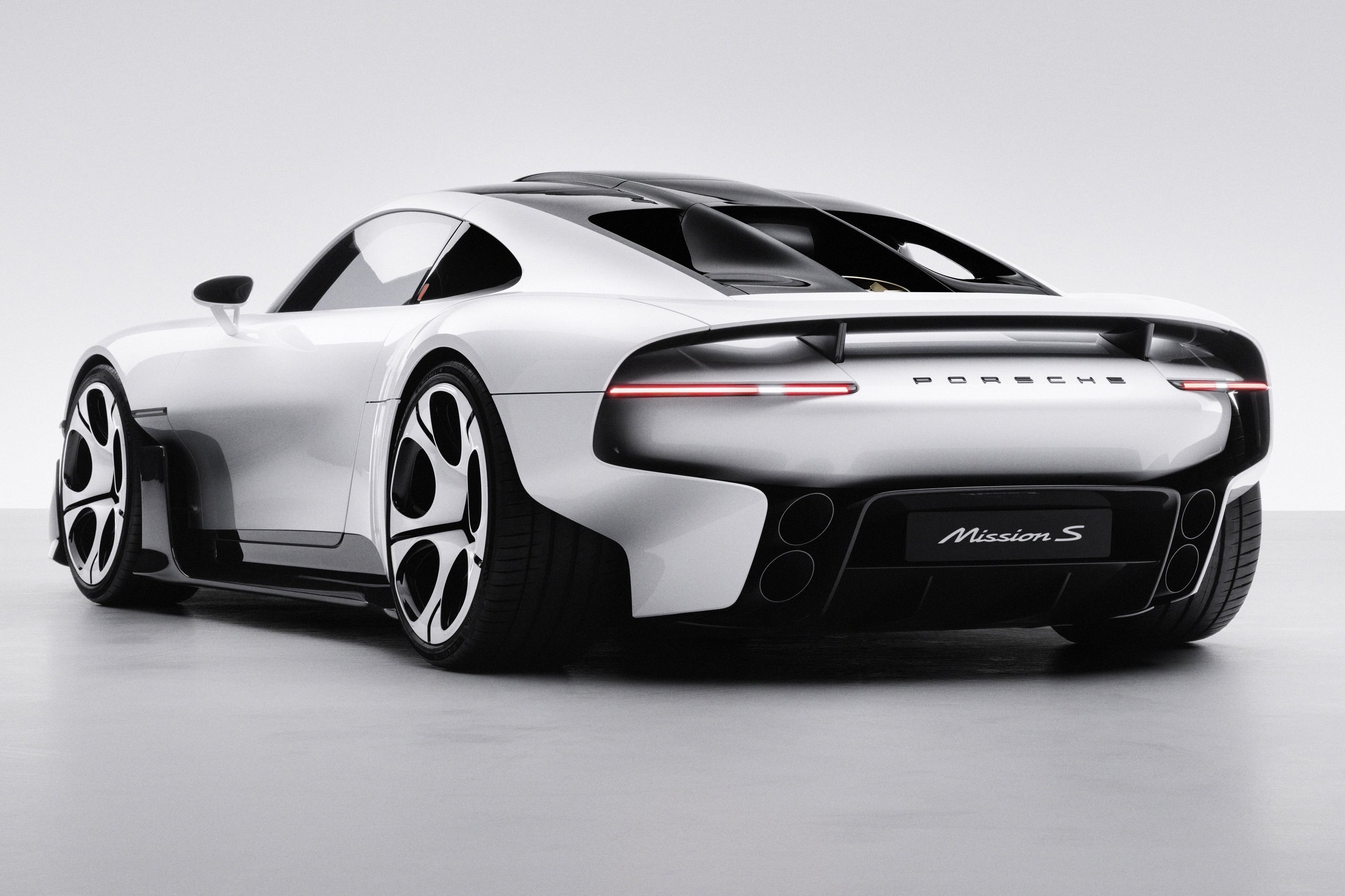 A full-width light bar and central exhausts signal the flagship's petrol-powered intent