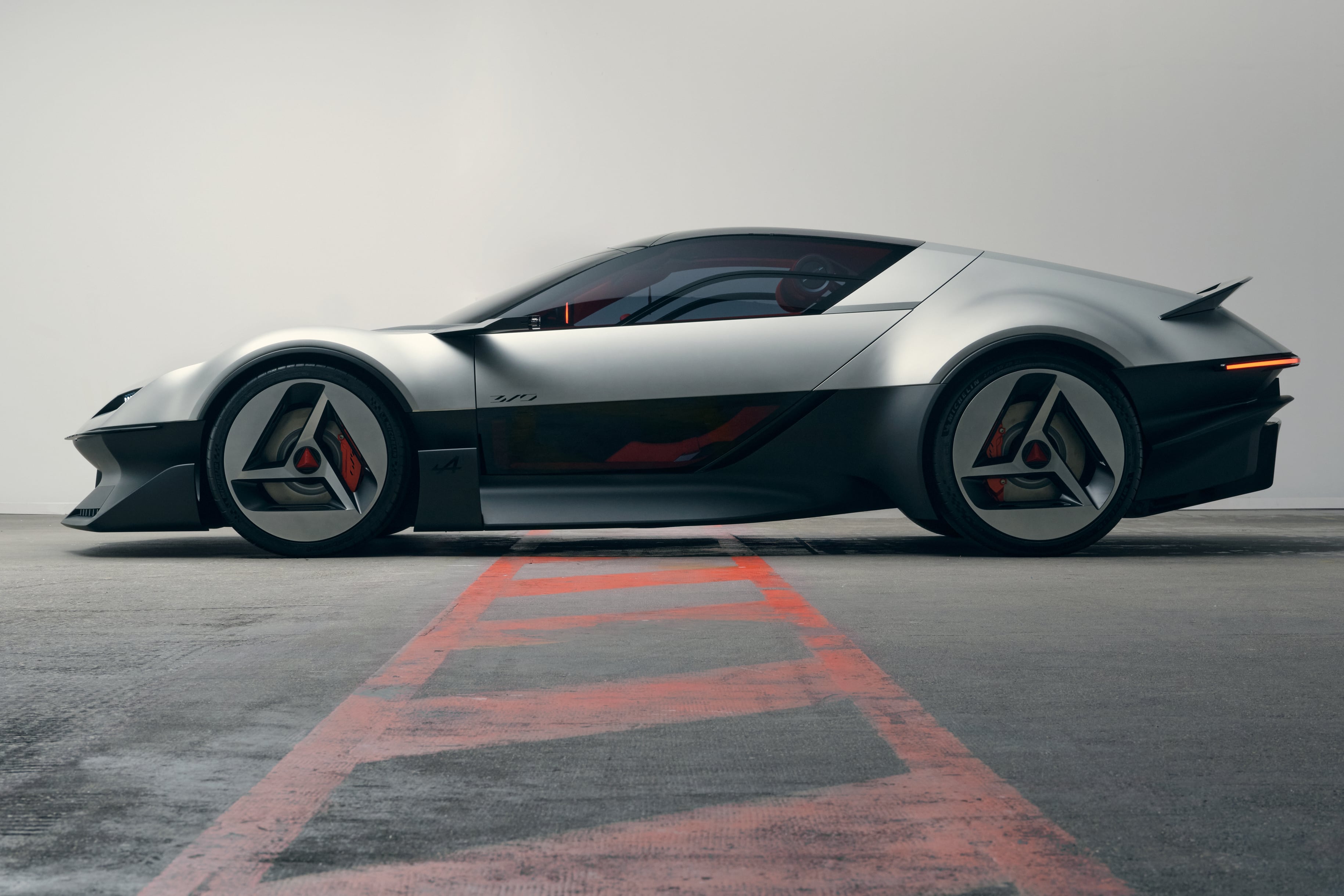 The concept's four-seat fastback profile mirrors the original A310's proportions