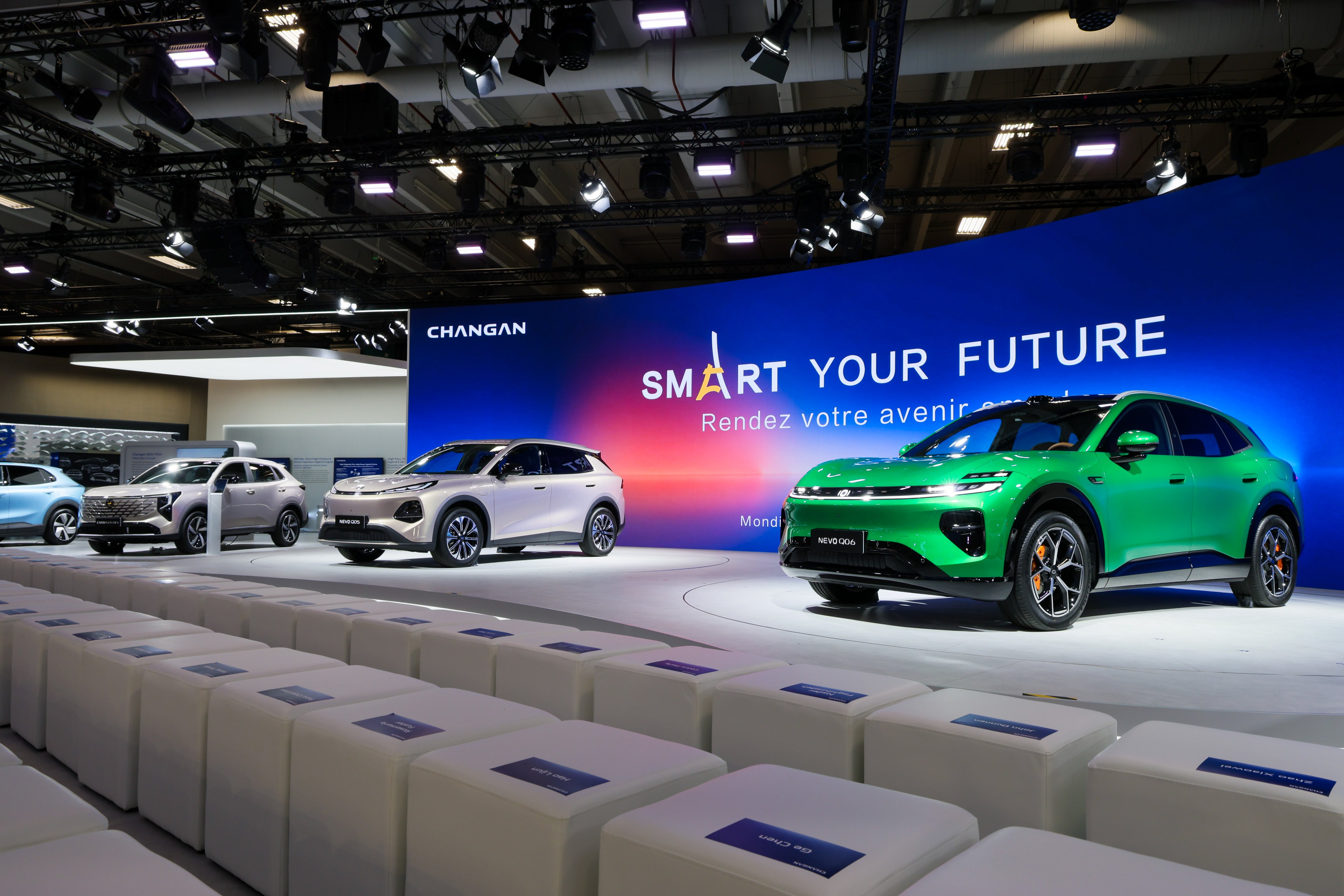 Changan's global line-up on a motor show stand, including the Deepal S07.