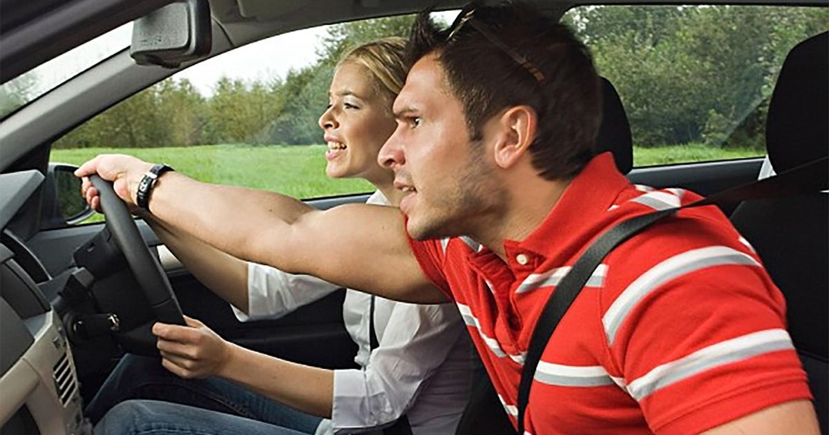 Is it illegal for a passenger to steer your car?