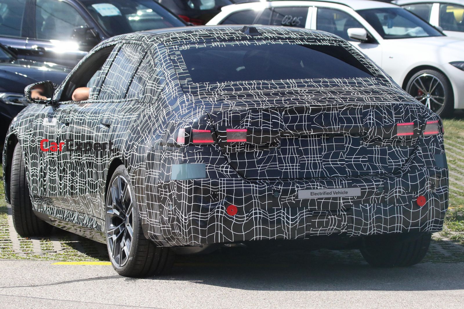 2024 BMW i5 EVs spied with less camouflage