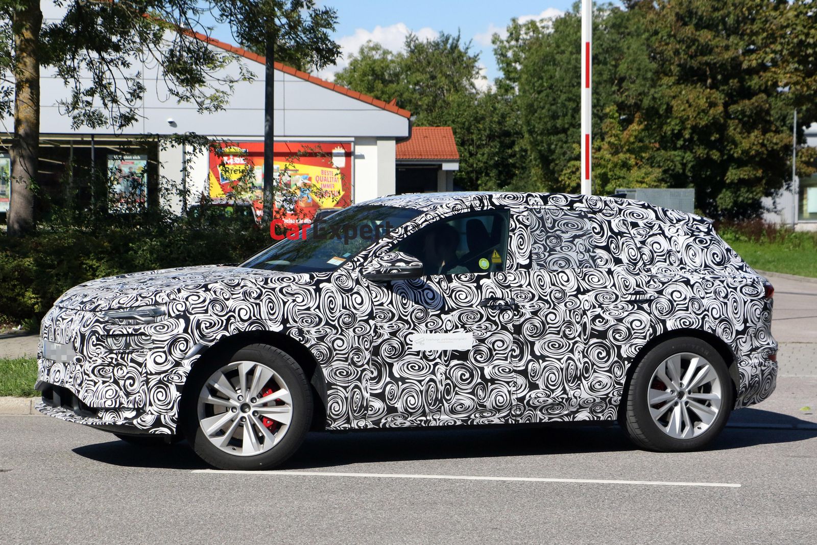 2024 Audi Q6 e-tron spied inside and out