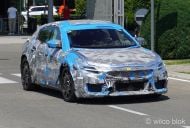 Ferrari’s electric Porsche Taycan, Tesla Model S rival spied