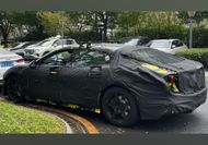 Lotus' new Porsche Taycan rival spied