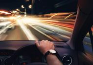 Is it legal to drive with one hand?