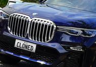 Is it legal to use a cloned or fake number plate that looks real?