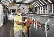 Ford reaches tentative deal to end strike, but not after racking up huge losses