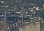 Climate protesters block Melbourne's West Gate Bridge, increasing emissions