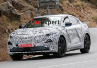 Renault's high-performance Macan EV rival spied