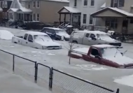 Dozens of cars stuck in ice after floodwater freezes