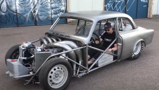 This V8 Volvo uses a two-stroke home-made boat engine, and it sounds nuts