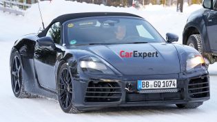 Porsche's first electric convertible spied