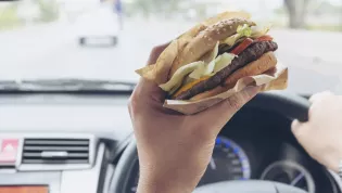 Is it illegal to eat while driving in Australia?