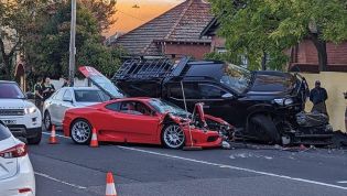 Rare Ferrari crashes into and upends pickup truck on Melbourne street