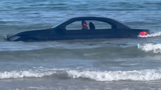 Coastguard tell floating BMW owner 'you can't park there sir!'