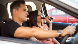 Is it legal for passengers to drink alcohol in a car?