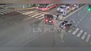 Watch this pedestrian cheat death in a shock two-car smash