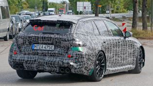 BMW's high-performance hero wagon spied