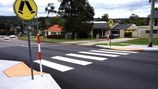 Is it legal to stop on a pedestrian crossing or a children’s crossing?
