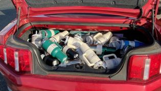 Thief shows how many Stanley cups can fit in a Ford Mustang