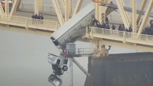Harrowing dashcam video shows what it's like to dangle off the side of a tall bridge
