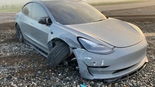 Watch as this Tesla almost Full Self-Drives into a train