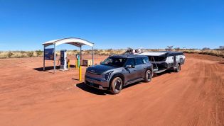 Family towing camper across Australia in an EV to prove ScoMo and doubters wrong