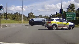 Dashcam captures ambulance knocking Chery onto its roof