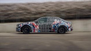 Electric BMW M3 teased as quad-motor performance sedan