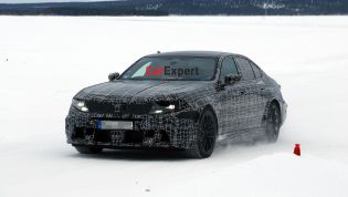 BMW M5 facelift spied just months after model debut