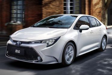 How much does a Toyota Corolla Hybrid cost around the world?