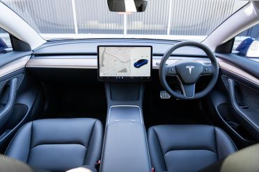 Updated Tesla Model 3 leaked, new dash cluster visible