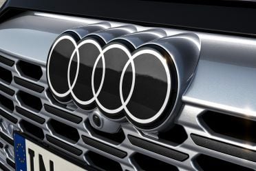 Audi drops chrome from car logos