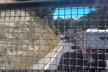 Truck's brakes fail down steep hill, oblivious caravan driver fails to get out of the way
