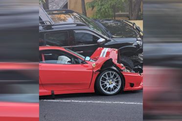 Rare Ferrari crashes into and upends pickup truck on Melbourne street