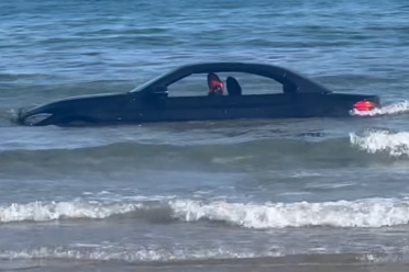 Coastguard tell floating BMW owner 'you can't park there sir!'