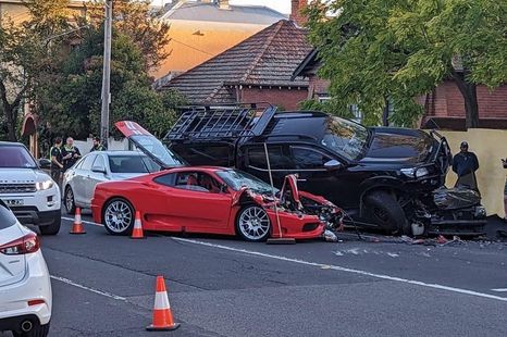 Rare Ferrari crashes into and upends pickup truck on Melbourne street