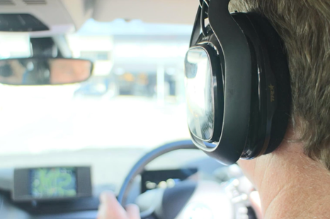 Is it legal to drive with headphones?