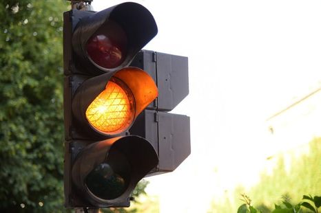 Can you be booked for running a yellow light?