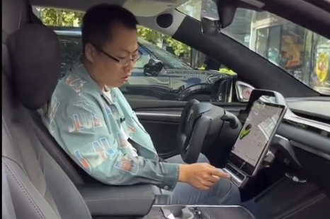 Teslas aren't supposed to have buttons? Tell this owner