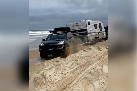 Porsche rescues big American pickup stuck on Aussie beach