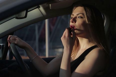 Is it illegal to do your makeup when driving?