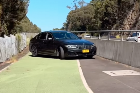 Hidden NSW Police car blocks bike lane to nab speeders