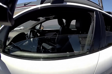 Watch this police officer pull over a driverless car going the wrong way