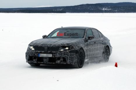 BMW M5 facelift spied just months after model debut