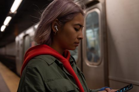 Is wearing earphones while driving illegal?